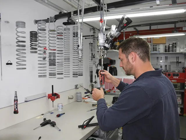 Farmington Garage Door Repair safety certified technician performing precision spring replacement in Farmington
